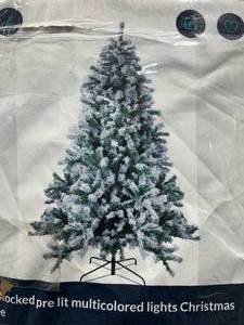 lot 89 image: 7 Flocked Pre-Lit Multi-Colored Lights Christmas Tree