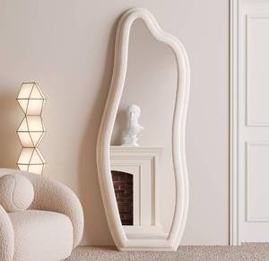 lot 104 image: BOJOY Full Length Mirror 63x24, Irregular Wavy Mirror, Wave Floor Mirror, Wall Mirror Standing Hanging or Leaning Against Wall for Bedroom, Flannel Wrapped Wooden Frame Mirror-White