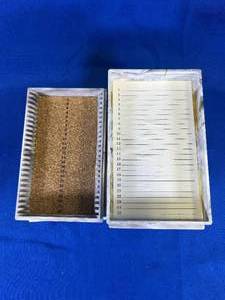 lot 13 image: 8 Microscope Slide Box, Marbled Black and White Plastic