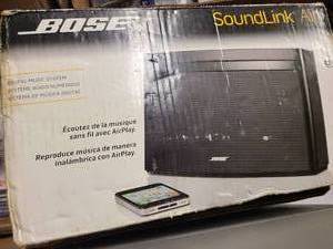 lot 35 image: Box of Vintage mobile phones from various eras in boxes and a bose sound system