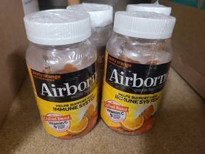 lot 165 image: 4 Bottles of Airborne Vitamin C boosting gummy supplements