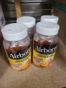 lot 166 image: 4 Bottles of Airborne Vitamin C boosting gummy supplements