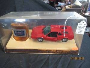 lot 37 image: 1970s still new in original package The Chaz Champion Cologne 3.5fl Oz and model car