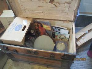 lot 70 image: Antique Wood Trunk with metal trim and hardware PLUS all the vintage goodies it holds such as Sports Illustrated Calendars, Tupperware and more. 341924