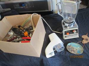 lot 77 image: Vintage Osterizer blender with glass carafe Plus tons of kitchen utensils and other helpers