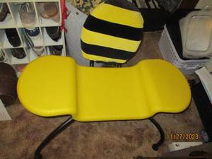 lot 85 image: Bumble Bee themed chair with writing surface area on each side