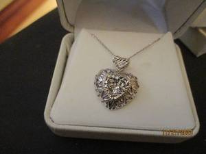 lot 28 image: Silver-tone Heart pendant on dainty necklace chain