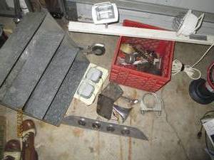 lot 107 image: Vintage automotive parts, track style treble work light and metal part organizer shelf