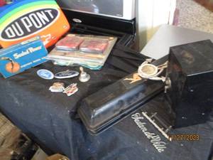 lot 113 image: Collection of Vintage automotive decals and accessories