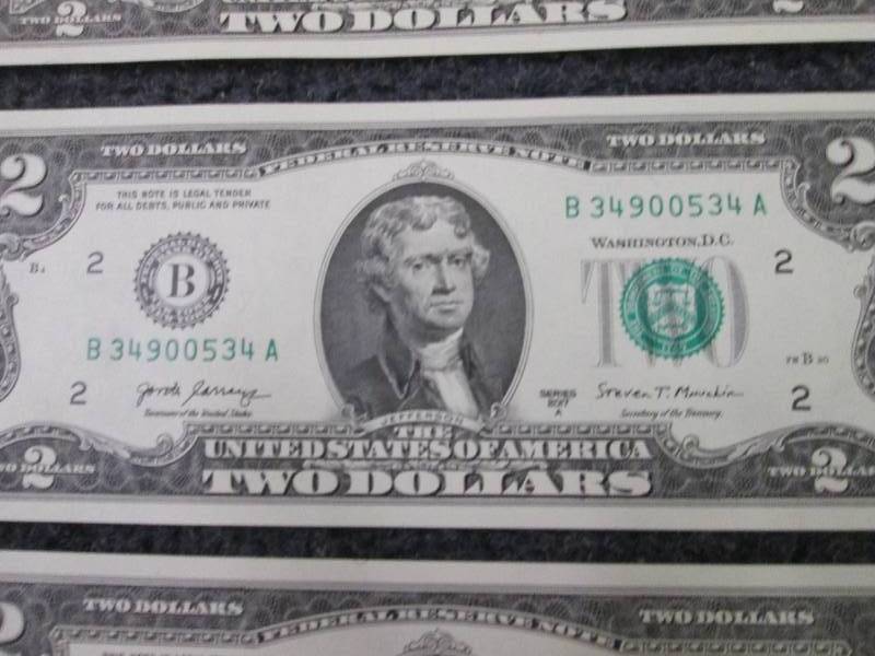 lot 499 image: 6 Uncirculated Sequential $2 Bills...