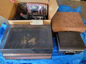 lot 1 image: RARE - Vintage Atari Game Center, Complete with Joy Sticks, Paddles, More than 30 Games, Instructions, and Manuals - Amazing Find