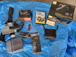 lot 12 image: New Electonic and Camera Accessories including a Nikon D7000 18-105 VR Kit, and More There are no Cameras in this Lot