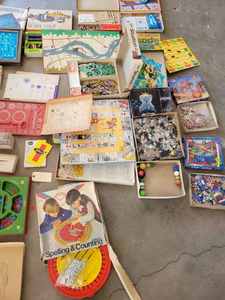 lot 21 image: Vintage Games, Spirograph, Spelling and Counting Game, Puzzles, Weaving Loom Set, and Craft Items