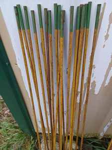 lot 49 image: Approx. 35 GardenUtility Fence Posts, about 40-inches tall, 18 Green Tip Posts - These are a bit Heavier than the all Yellow Posts