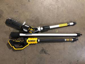 lot 22 image: DEWALT 20V MAX 8in. Cordless Battery Powered Pole Saw Kit with (1) 4Ah Battery, Charger & Sheath  Customer Returns See Pictures