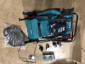 lot 24 image: Makita 18-Volt X2 (36V) LXT Lithium-Ion Cordless 21 in. Walk Behind Self-Propelled Lawn Mower Kit w4 Batteries (5.0Ah)  Customer Returns See Pictures