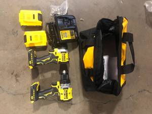 lot 31 image: DEWALT 20V MAX XR Cordless DrillDriver, ATOMIC Impact Driver 2 Tool Combo Kit, (2) 2.0Ah Batteries, Charger, and Bag Customer Returns See Pictures