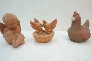 lot 51 image: Clay yard decor