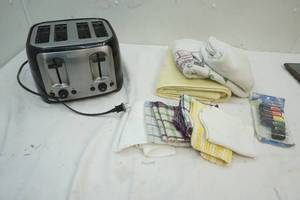 lot 254 image: Towels, Dish Cloths, sewing thread, Toaster