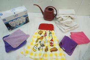 lot 263 image: Variety of Towels, dish cloths, light bulbs, and plant watering  container