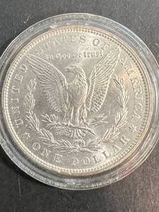1886 US MORGAN SILVER DOLLAR IN AIRTITE