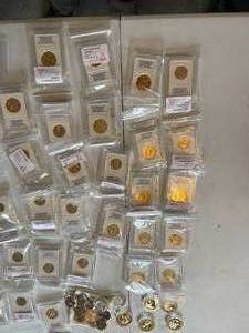 lot 47 image: Presidential 24K Gold Enriched $1 and $.50 Coins
