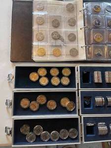 lot 52 image: Uncirculated Sacajawea Golden Dollars, 100 $.50 pieces, 100 $1 coins