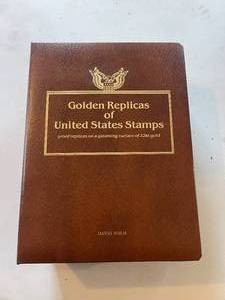 lot 54 image: 75 Individual Golden Replicas of United States Stamps