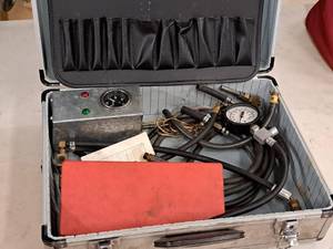 lot 62 image: Fuel Pump Tester Kit with Metal Case