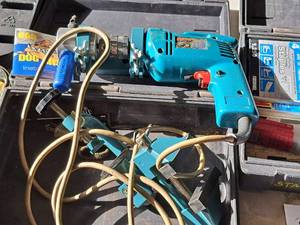 lot 86 image: Makita Mad Dog Biter 10mm Drill with Accessories and Case