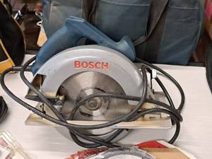 lot 90 image: Bosch 7-14 Circular Saw 1658 with Extra Saw Blades and Case
