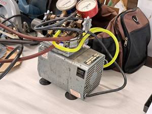 lot 91 image: Gast Vacuum Pump DOA-V141-AA with Regulators and Case