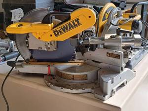 lot 113 image: DeWalt 12 Double Bevel Sliding Compound Miter Saw DW718