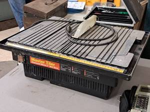 lot 170 image: Plasplugs Master Tiler 7 Wet Saw w Diamond Wheel