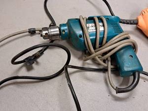 lot 204 image: Makita 10mm Drill DP3720