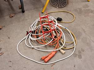 lot 234 image: (5) Extension Cords and (1) Cord Holder