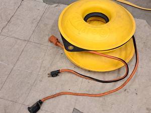 lot 243 image: (2) Extension Cords and (1) Cord Pro Cord Reel