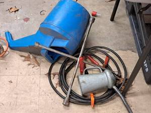 lot 251 image: Lot of (3) Automotive Accessories - Lug Wrench, Oil Cans, Jumper Cables