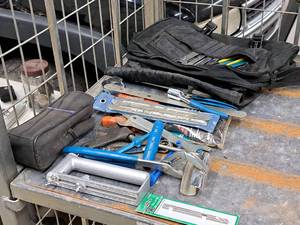 lot 389 image: 16 Tool Bag with Wrenches, Tire Lever, Rivet Gun, Hole Cutter