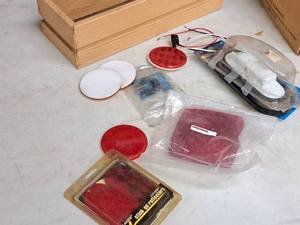 lot 414 image: Lot of (1 Box) Trailer Light Parts