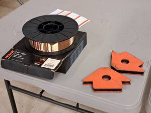 lot 13A image: Hobart Welding Wire Spool with Two Magnets ER70S-6