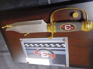 lot 28 image: Tribute To Legend Large Knife and Plaque, Knife Measures 12.75-inches Long, Knife Blade Measures 7.75-inches Long X 1.75-inches Wide,