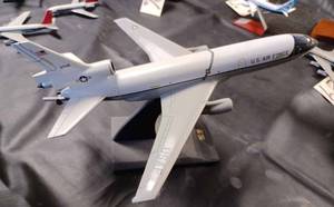 lot 31 image: Plastic KC-10 United States Air Force 1150th Scale on a Wood Stand, Plane Measures 14.5-inches Long, 13-inches Wide Wing Tip to Wing Tip, 8.5-inches