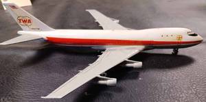 lot 34 image: TWA N747 TW Die Cast Metal Airplane with Folding Landing Gear, Made by Aero Mini, Plane Measures 9.25-inches Long, 8-inches Wide Wing Tip to Wing Tip
