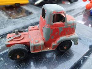 lot 59 image: Vintage Tootsie Toy Truck, 116th Scale Airport Baggage Cart, Plastic Ford Galaxy Missing Top, Plasto Plastic Wheel Loader, and Other Toys