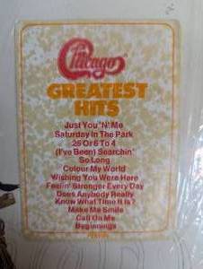 lot 69 image: Chicago - Chicagos Greatest Hits IX - 1975 - Vinyl - Promo Sticker