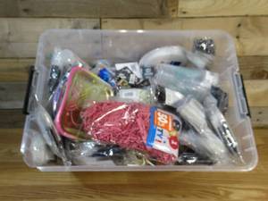 Bin of Various Party Supplies