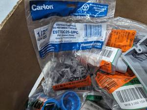 Bin of Mixed Gas and Plumbing Accessories