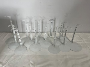 lot 8 image: 14 Adjustable Doll Stands