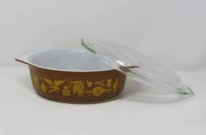 lot 35 image: Pyrex Casserole Pair (oval and round) gold leaf pattern and early american